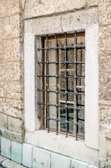 Fototapeta na wymiar Bound window with bars 