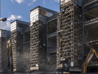 Naklejka premium Demolition of old industrial building whith metal carcass