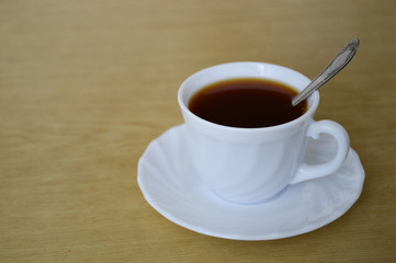 A cup of tea with a saucer