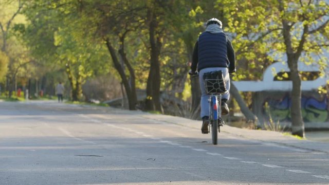 Man On A Bike Commuting To Work