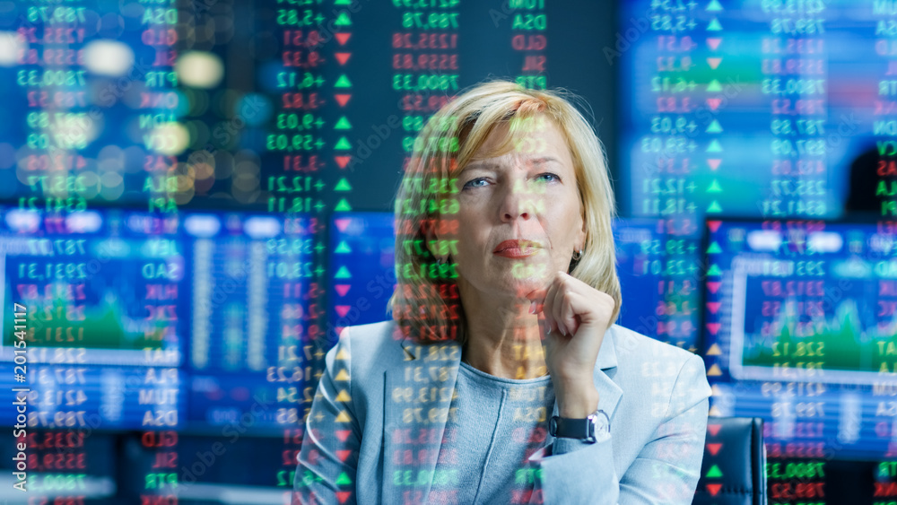 Poster stock market female top manager looks at projected ticker numbers and graphs. behind her room full o