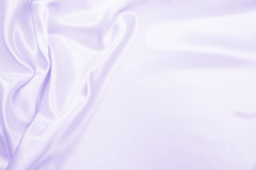 Obraz na płótnie Canvas Smooth elegant lilac silk or satin texture as wedding background. Luxurious background design