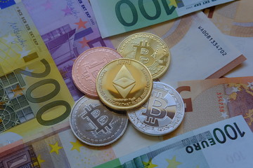 Euro in banknotes and coin bitcoin