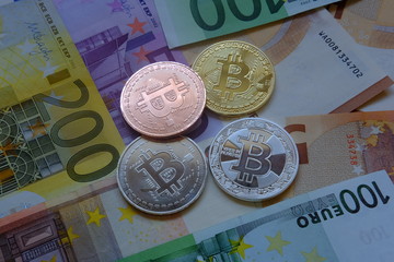 Euro in banknotes and coin bitcoin