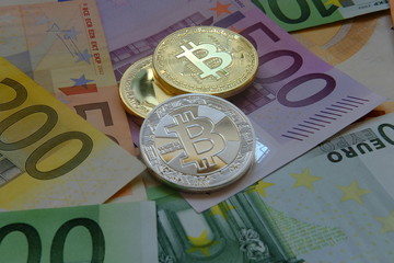 Euro in banknotes and coin bitcoin