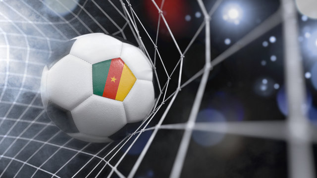 Realistic soccer ball in the net with the flag of Cameroon.(series)