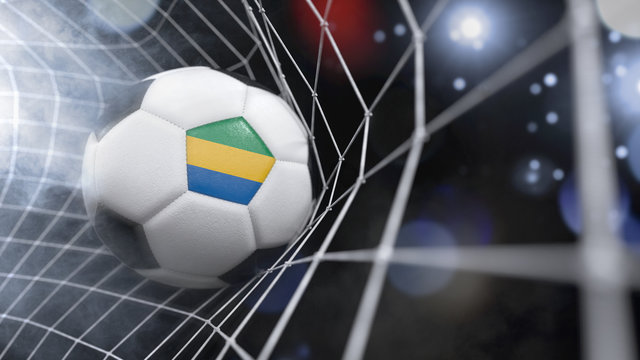 Realistic soccer ball in the net with the flag of Gabon.(series)