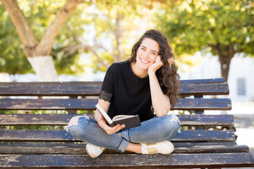 Relaxing at park with a novel