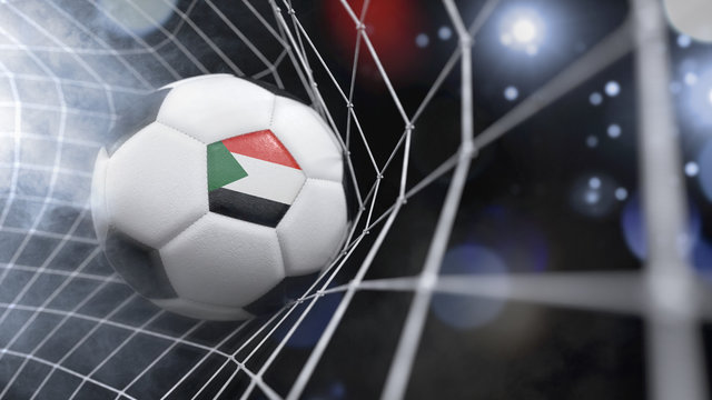 Realistic soccer ball in the net with the flag of Sudan.(series)