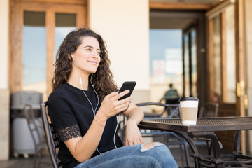 Listening music at street cafe