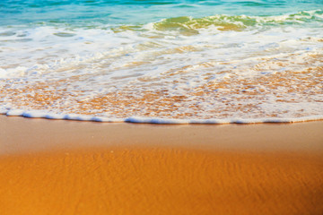 Soft wave of ocean on the sandy beach