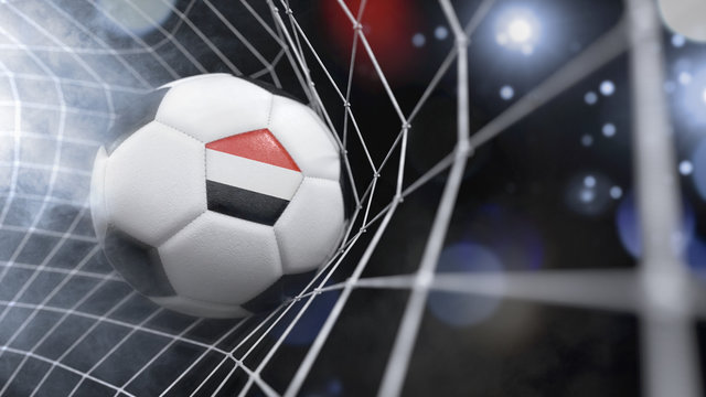 Realistic soccer ball in the net with the flag of Yemen.(series)