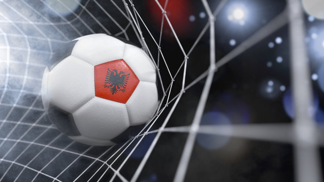 Realistic soccer ball in the net with the flag of Albania.(series)