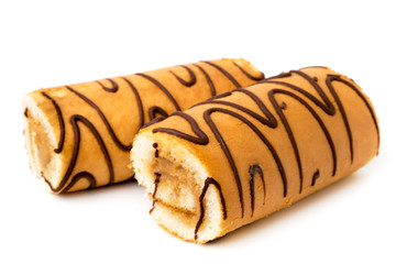 Two biscuit rolls on a white background.