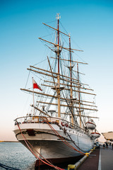 Fototapeta na wymiar old sailing ship, frigate at anchor in the port