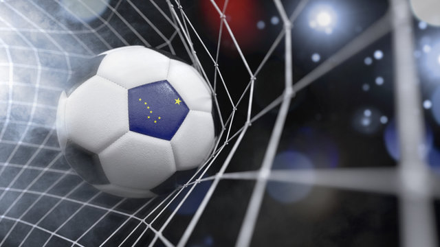 Realistic soccer ball in the net with the flag of Alaska.(series)