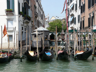 Fototapeta na wymiar Gondolas at Canale Grande in Venice