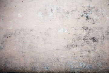 Brown plaster wall. Stucco surface background. Grunge scratched concrete panel