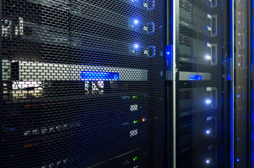  Futuristic techno design on background of fantastic supercomputer data center. Network server room with computers for digital communications and internet,abstract data concept.