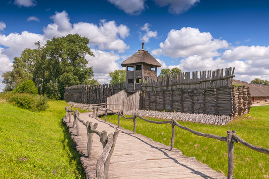 Reconstruction of the defensive shaft and gate to the Lusatian settlement in archeological museum in Biskupin, Poland.