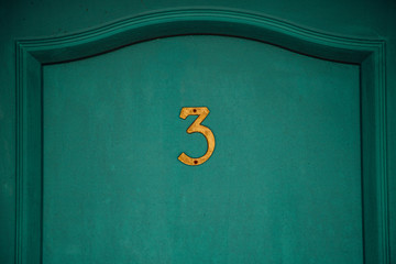number three on old motel door - 201555972