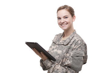 Attractive female soldier with digital tablet © Straight8Stock