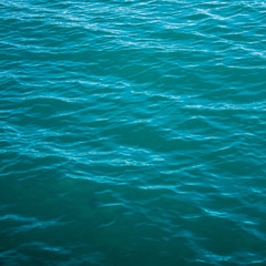 Obraz premium Black sea texture. Turquoise sea water with ripple. Peaceful nature minimal concept.