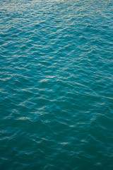 Black sea texture. Turquoise sea water with ripple. Peaceful nature minimal concept.