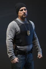 Fototapeta premium Officer that is angry with a badge and gun.