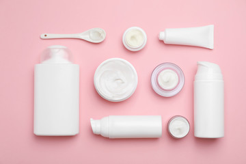 Flat lay composition with cosmetic products on color background