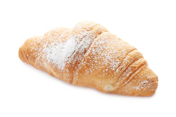 Tasty croissant with sugar powder on white background