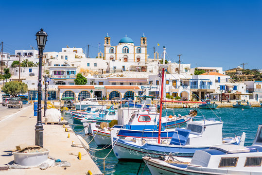 Fototapeta Beautiful white blue greek church situated in the streets of Lipsi at the mediterranean sea sourrounded by beautiful landscape and magical bays, Lipsi, Patmos, Dodecanese, Greece