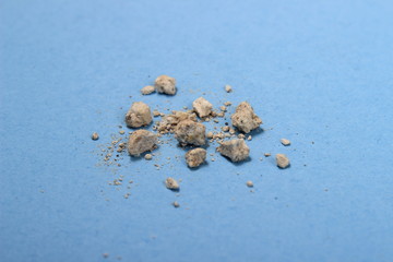 very small kidney stones at blue background