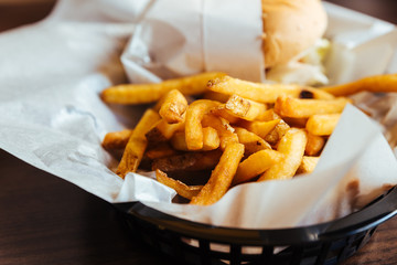 Burger set served with french fried and ketchup.