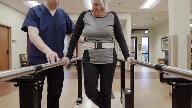 Medium shot of a senior woman doing stability exercise