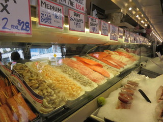 Fresh fish, shrimp and scallops for sale at a fish market