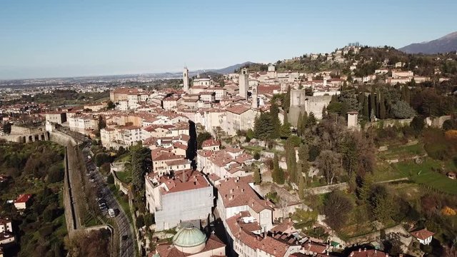 Drone aerial view of Bergamo, Italy. The Old city. Landscape on the city center, the old fortress and its historical buildings