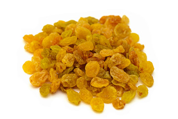 handful of dried raisins on a white background