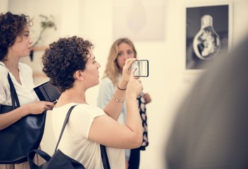 people checking out the exhibition