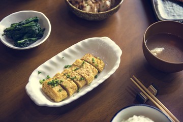 Sweet omelette set on wooden table