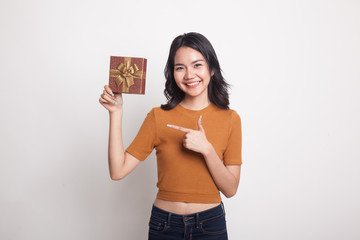 Young Asian woman with a gift box.