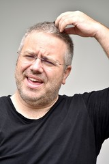 Obraz premium Confused Caucasian Male