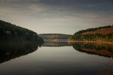 Panorama view of a mountain lake in the morning. Okertalsperre, Okerstausee, National Park Harz in Germany