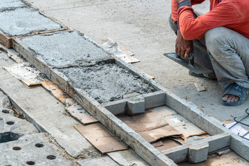 Worker was construction pipe cap cement.