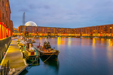 Night view of illuminated albert dock in Liverpool, England