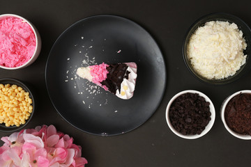 Strawberry milk cake on black background