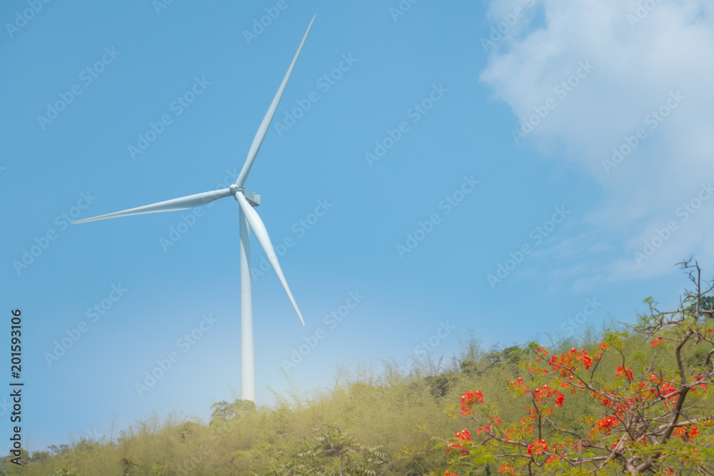 Wall mural wind turbine for alternative energy on background sky