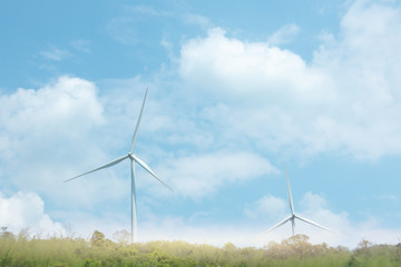 Wind Turbine for alternative energy on background sky