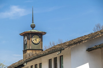 Old clock tower at nice sunny day with blue sky