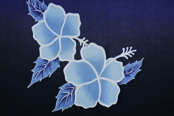 Fototapeta na wymiar Blue batik with floral pattern 